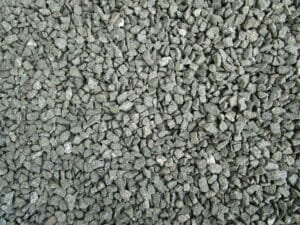 Detailed view of grey gravel stones commonly used in construction and landscaping.